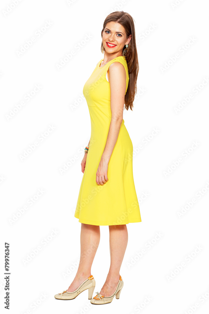 Fashion yellow dress. Smiling woman full body portrait white ba Fashion yellow dress. Smiling woman full body portrait white ba