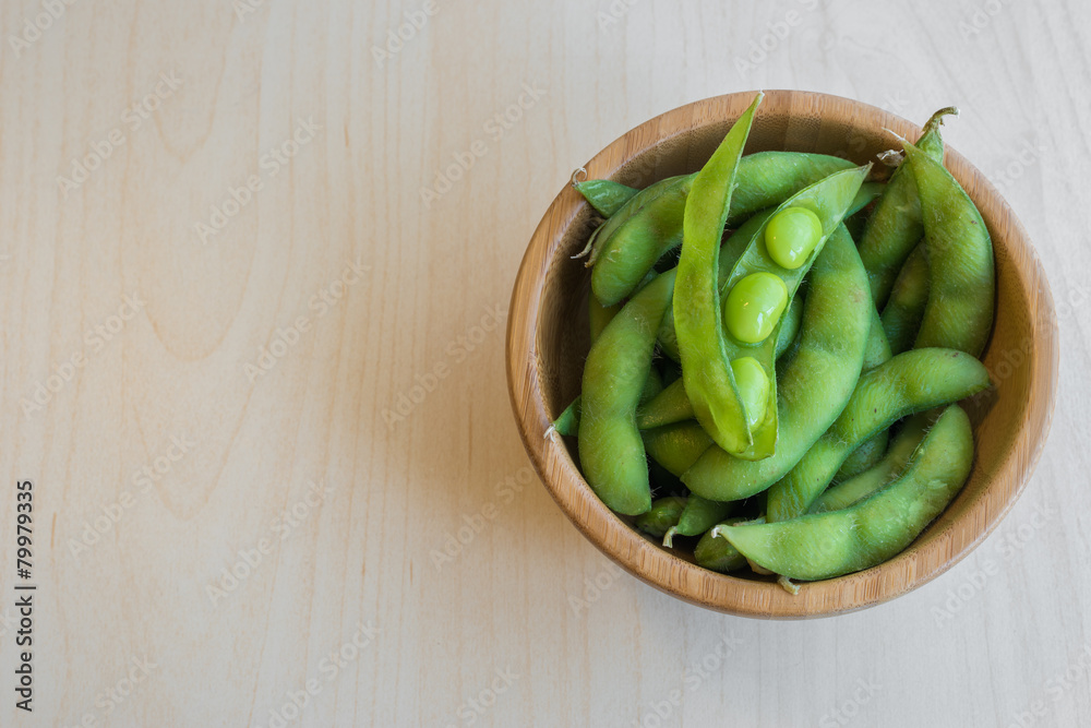 Japanese green soybeans on the wooden table. Japanese green soybeans on the wooden table.