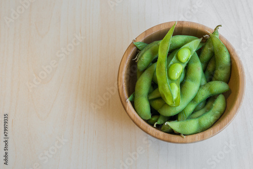 Japanese green soybeans on the wooden table.