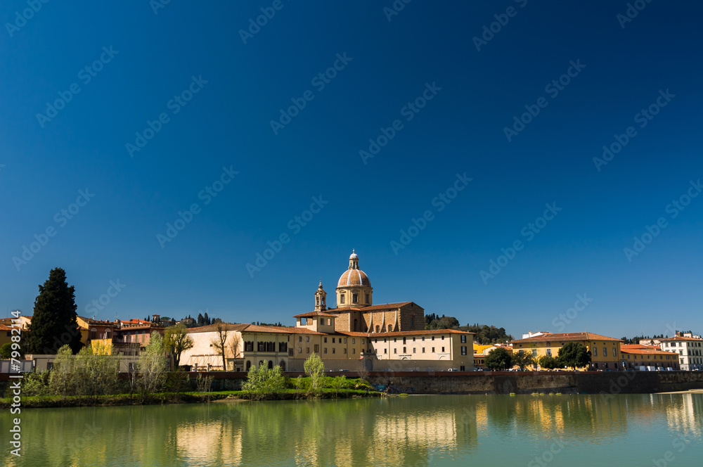 Sunny view of Church San Frediano in Cestello and river Arno.