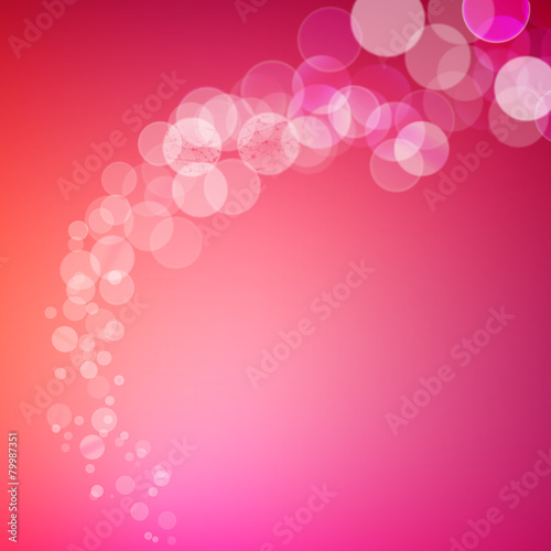 Abstract bokeh sparkles swirl on blurred background