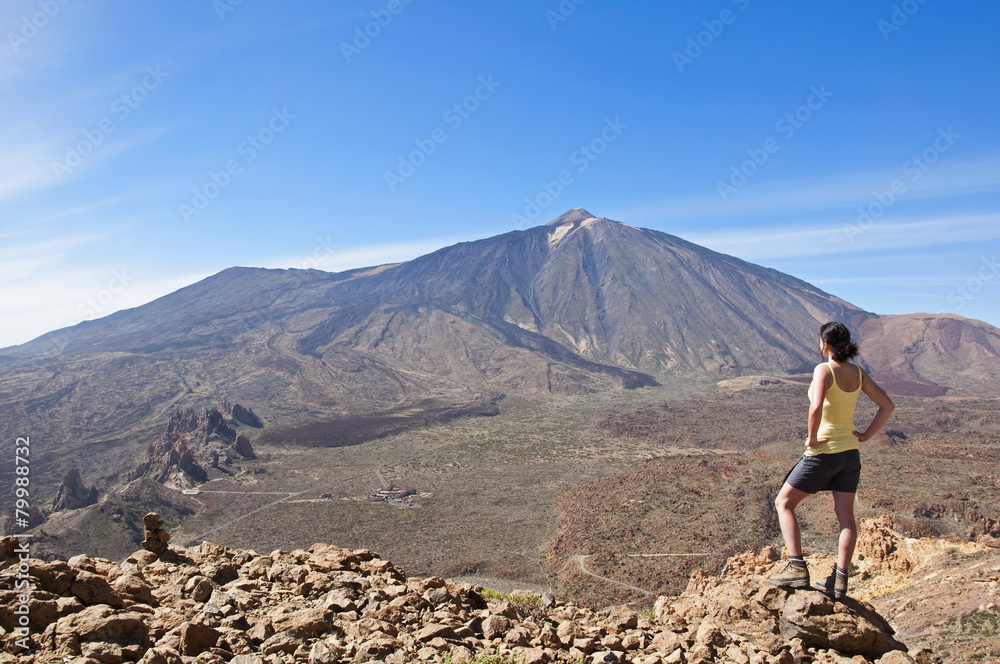 Spain, Canary Islands, Tenerife, Roques de Garcia, Mount Teide, Teide National Park, Female hiker in the Caldera de las Canadas Spain, Canary Islands, Tenerife, Roques de Garcia, Mount Teide, Teide National Park, Female hiker in the Caldera de las Canadas