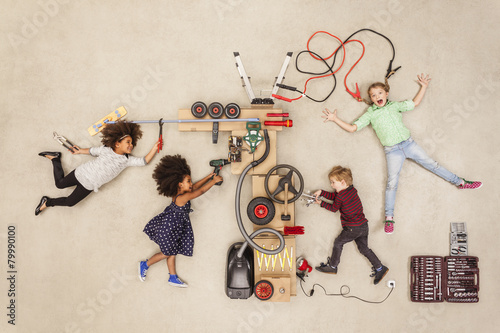Children experimenting with electricity photo