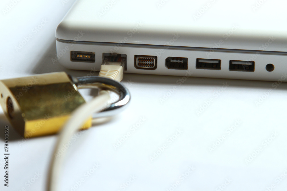 Fototapeta premium Lock on white laptop at the desk