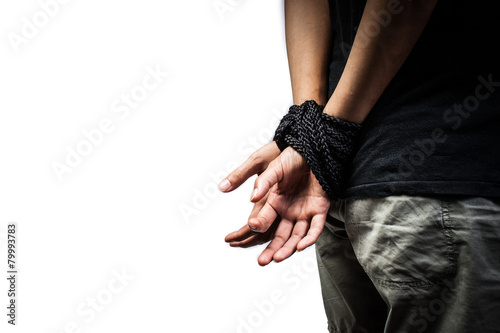 Hands of a missing kidnapped, abused, hostage, victim woman tied
