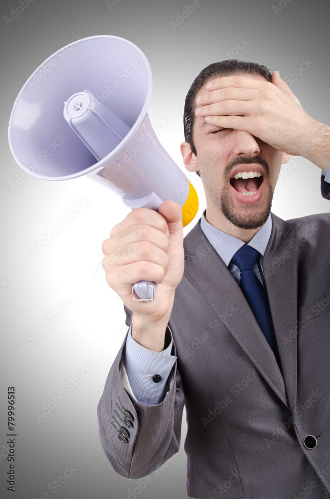 Man shouting and yelling with loudspeaker Man shouting and yelling with loudspeaker