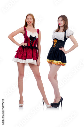 Girls in bavarian costumes isolated on white