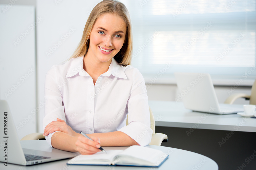Young business woman using laptop Young business woman using laptop