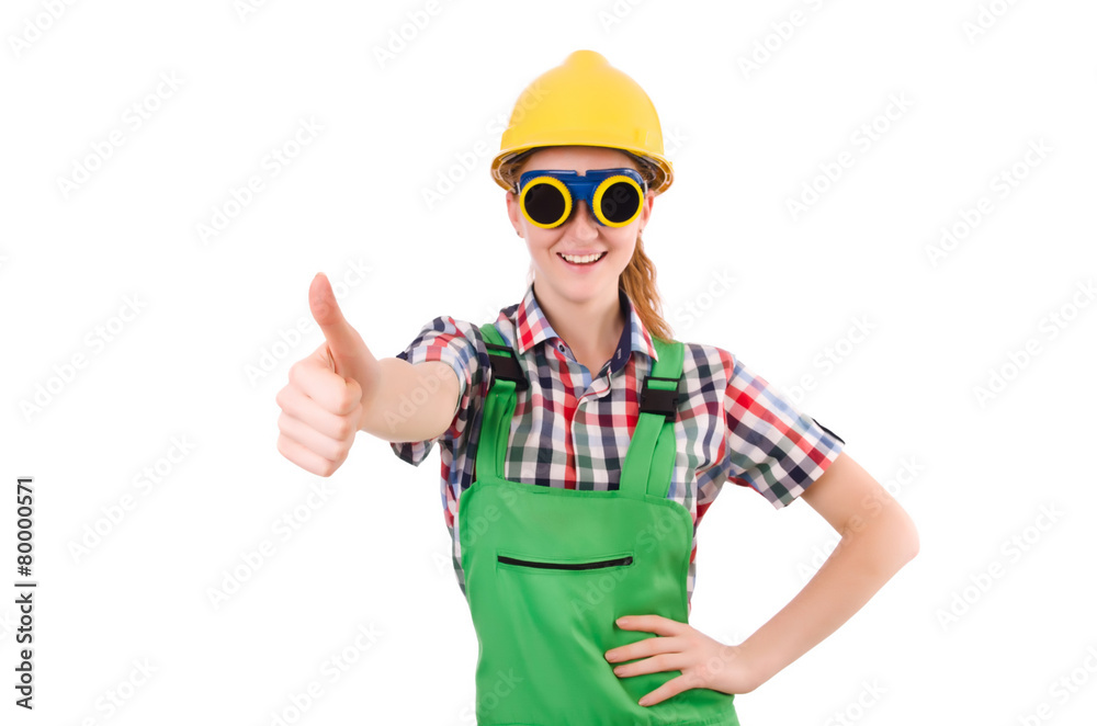 Female handyman in overalls isolated on white