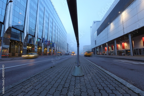 Urban road in the morning mist