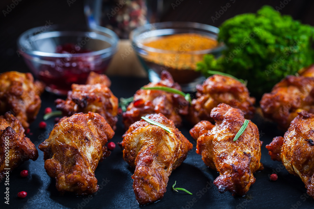 BBQ chicken wings with spices and dip