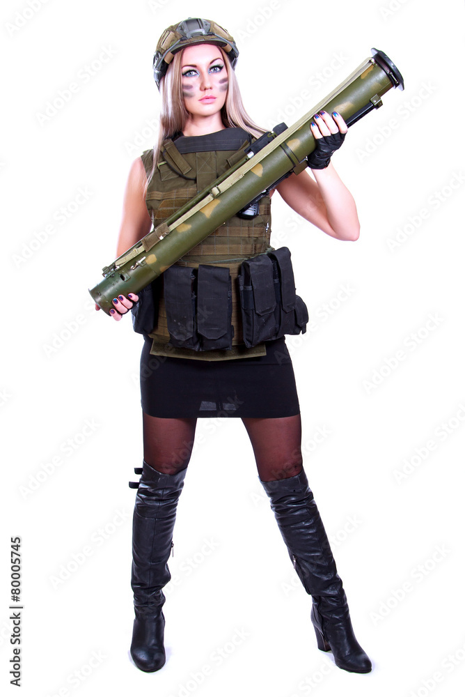 Woman in a military camouflage with a bazooka Woman in a military camouflage with a bazooka