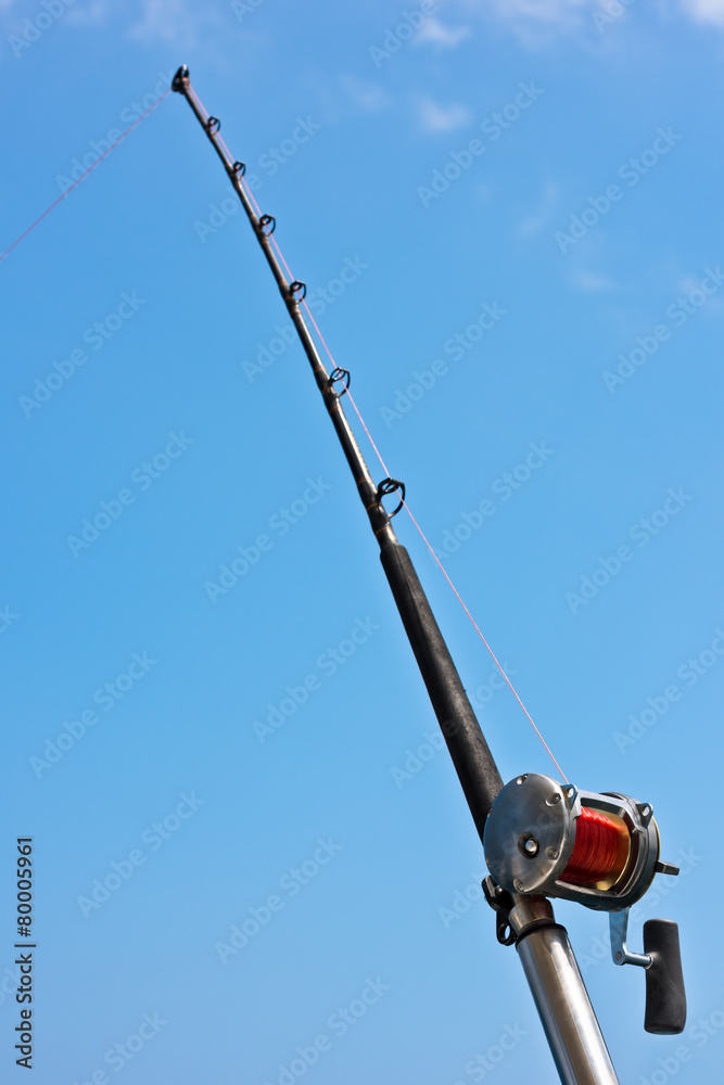 Fishing rod and reel on a yacht Fishing rod and reel on a yacht