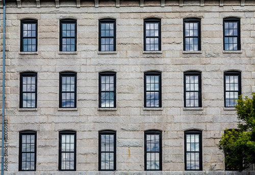 Eighteen Windows in Granite Block Wall