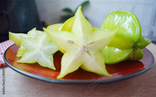 closeup sliced star fruit on a plate