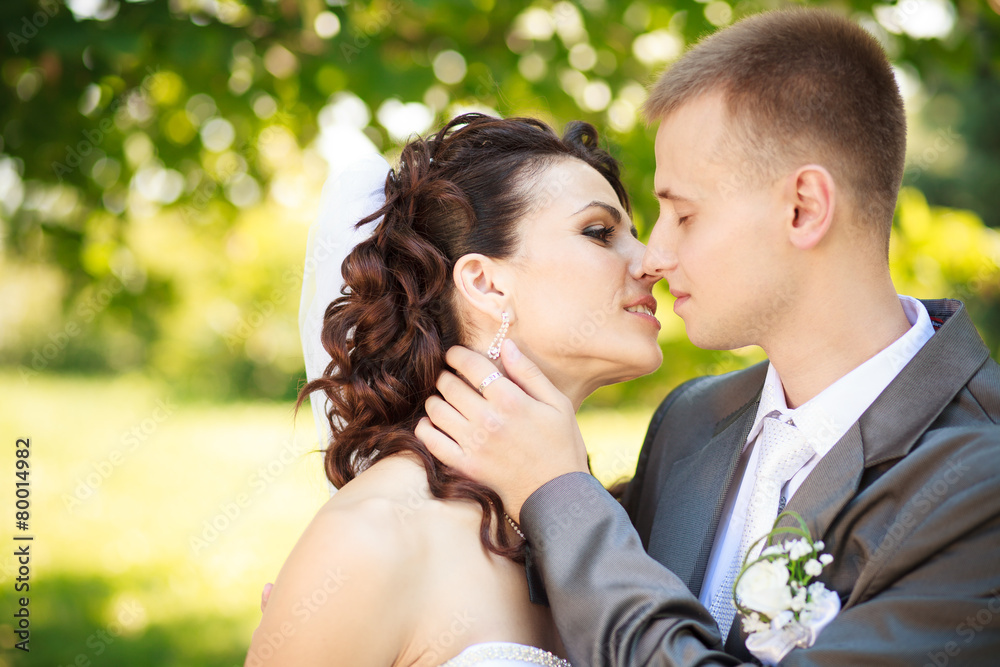 The groom kisses the bride The groom kisses the bride