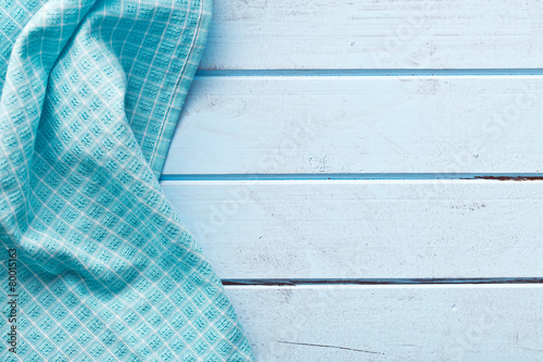 checkered napkin on blue table