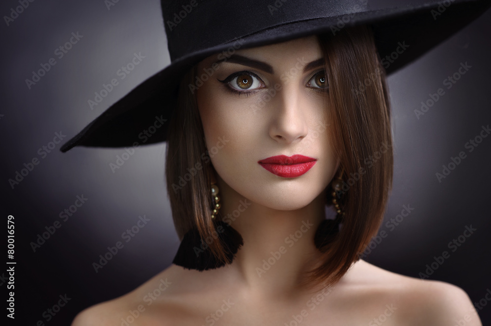 beautiful girl with makeup in hat and earrings beautiful girl with makeup in hat and earrings