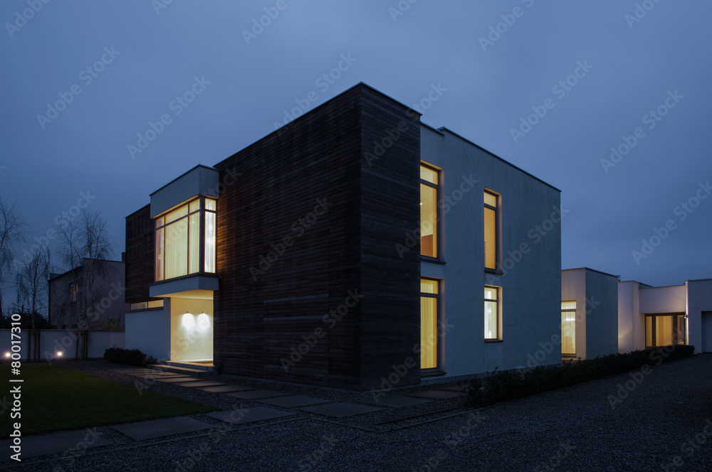 Illuminated windows in detached house Illuminated windows in detached house