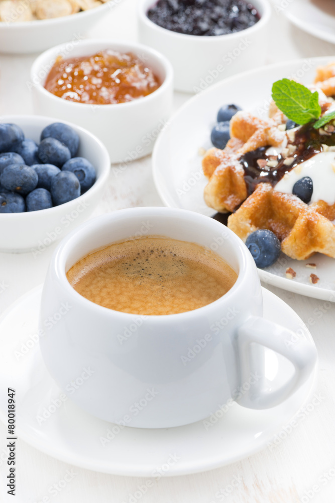 breakfast with waffles, fresh blueberries, cream breakfast with waffles, fresh blueberries, cream