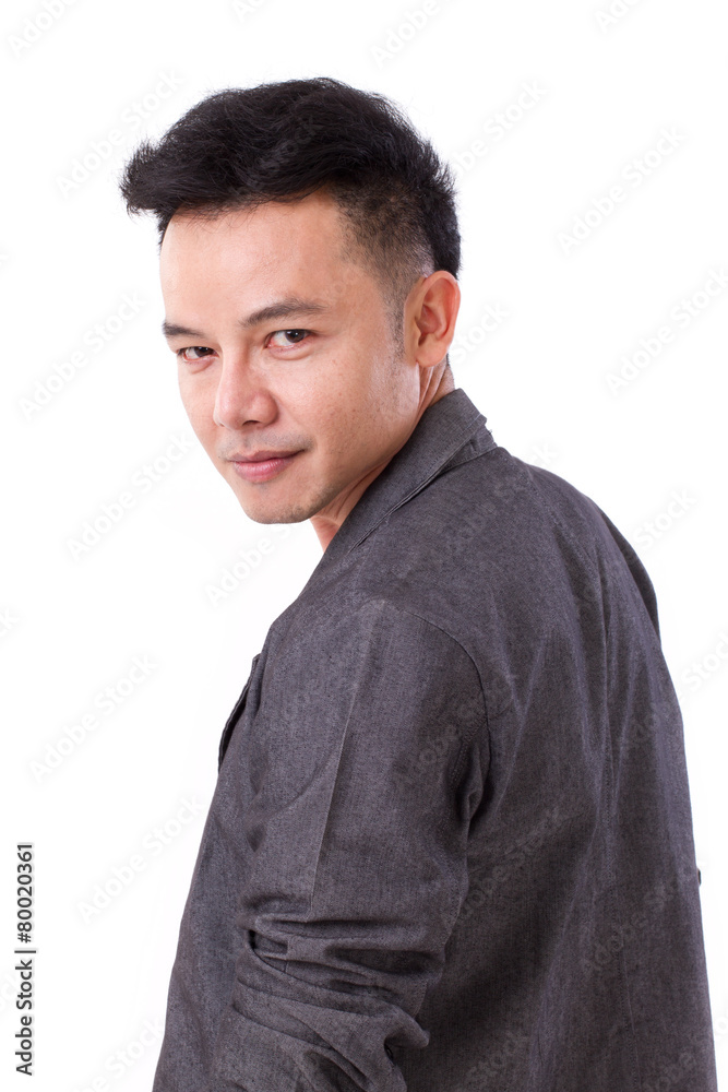 portrait of confident, happy, positive asian man looking over sh portrait of confident, happy, positive asian man looking over sh