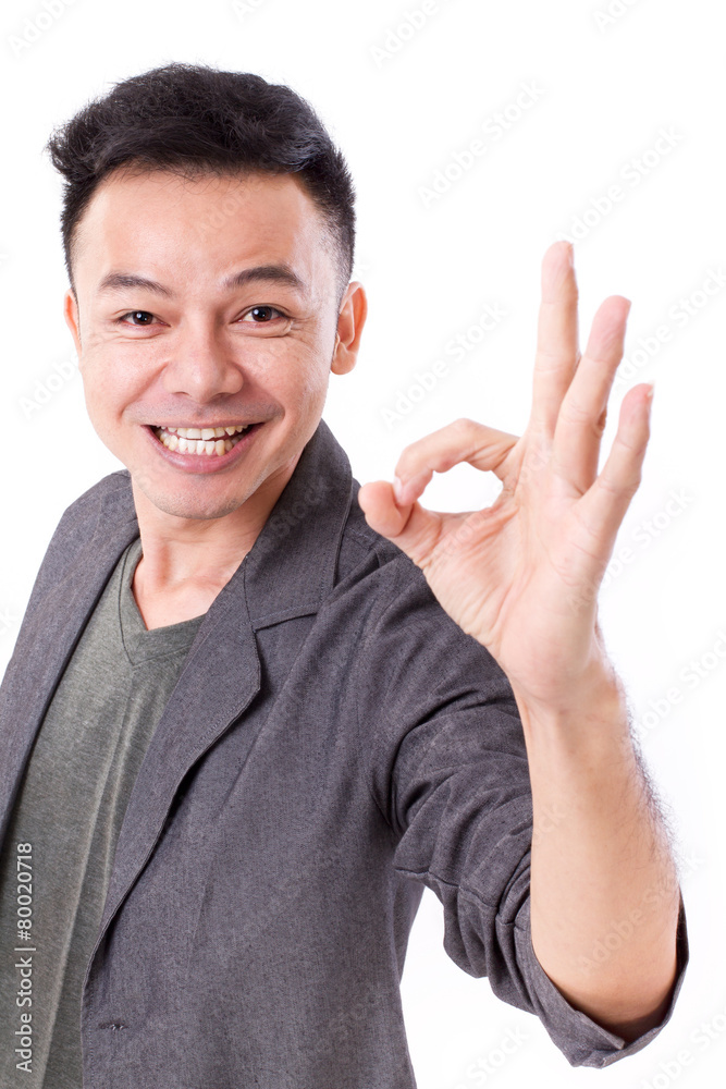 happy, smiling, exited man giving ok hand gesture happy, smiling, exited man giving ok hand gesture
