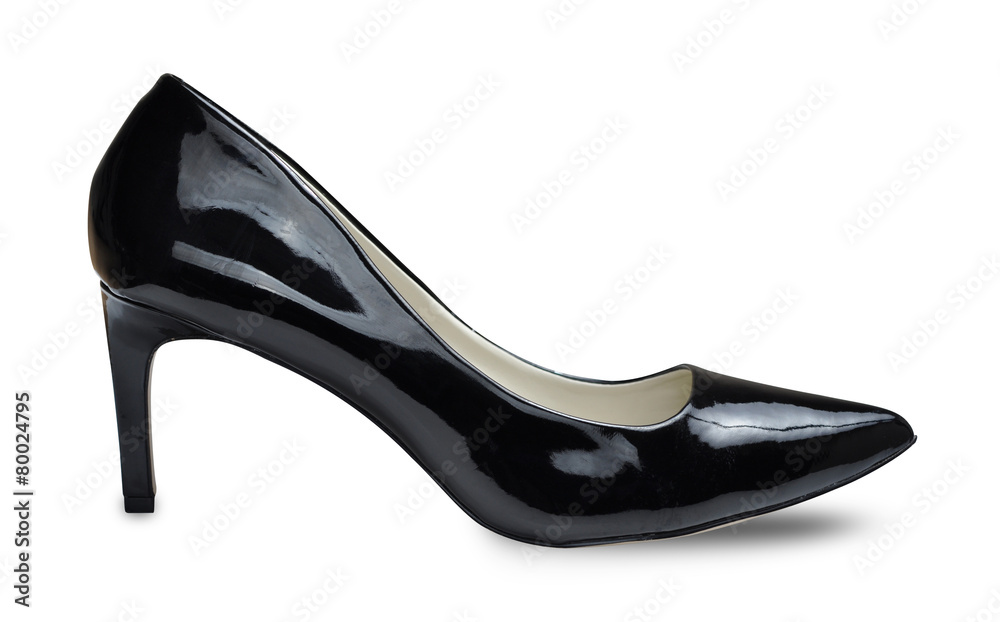 Black female shoes on a high heel. Isolated on white background Black female shoes on a high heel. Isolated on white background