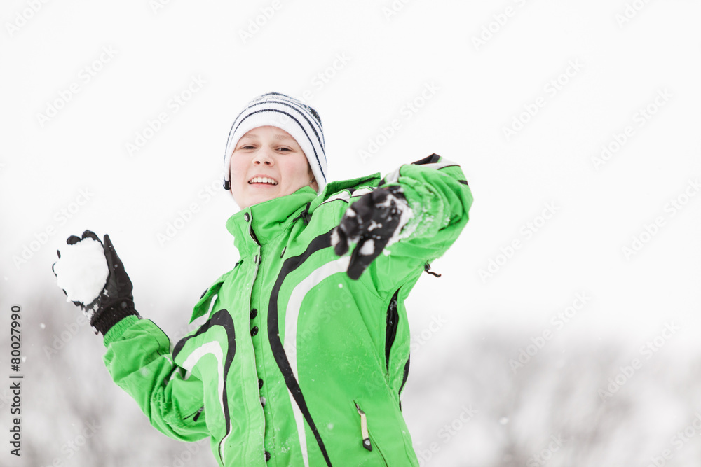 Young boy enjoying the cold winter weather Young boy enjoying the cold winter weather