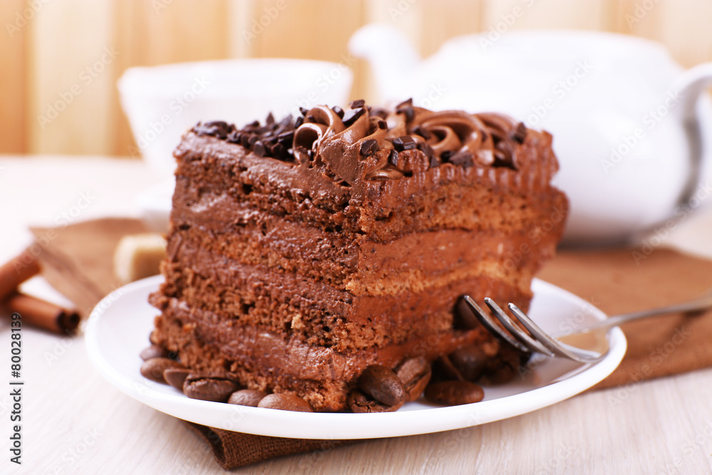 Tasty piece of chocolate cake with mint and cinnamon Tasty piece of chocolate cake with mint and cinnamon