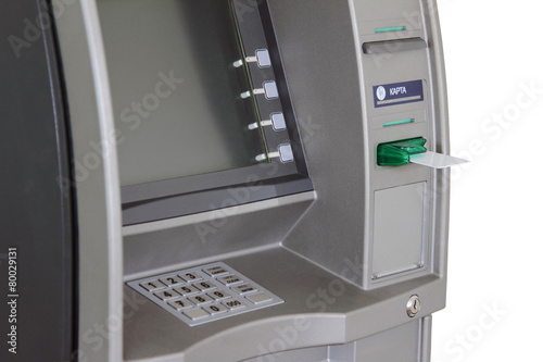 ATM with anti-skimmer and white plastic card photo