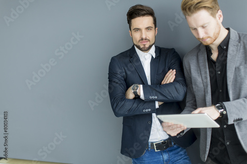 Young men with tablet