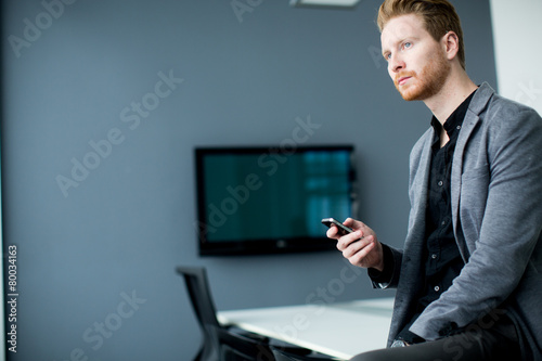 Young man with mobile phone
