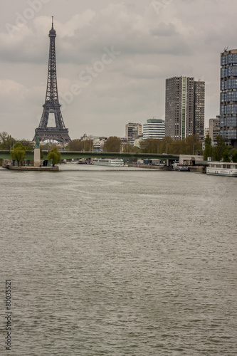 Eiffel tower and small statue of Liberty - Paris.