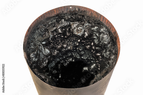 Dangerous accumulation of Creosote in a Chimney Pipe.