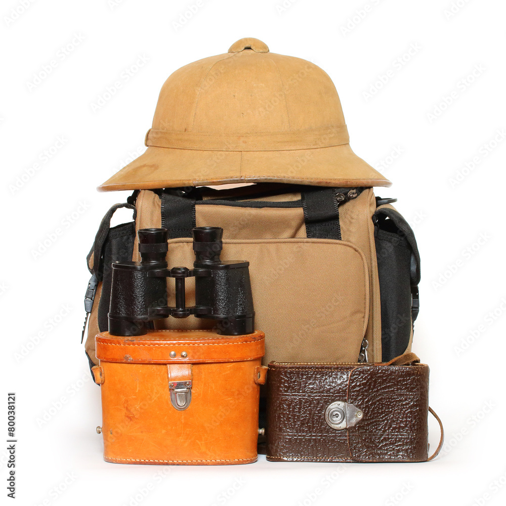 Retro travel baggage with tropical hat and binocular. StockFoto