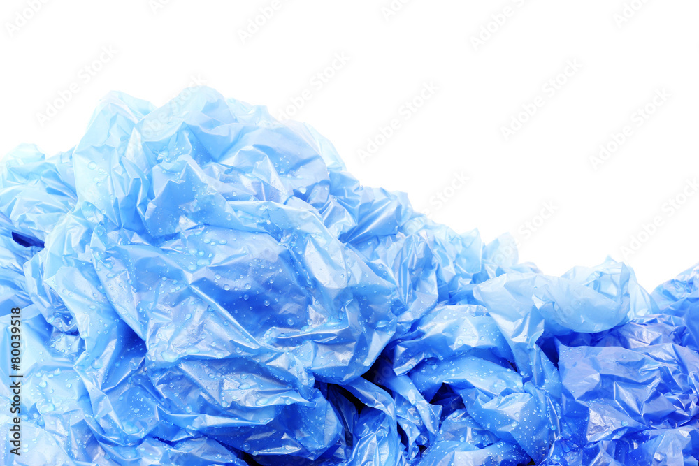 Fototapeta premium Blue plastic garbage bags with water drops