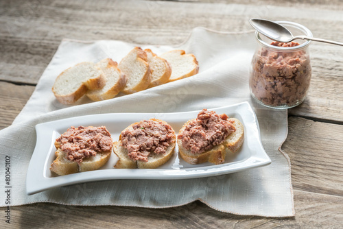 Sandwiches with pate on the wooden board