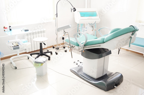 Gynecological chair in gynecological room