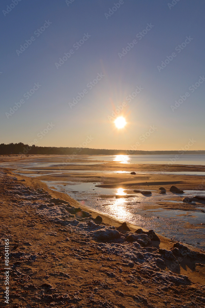 Northern seashore landscape with sunset