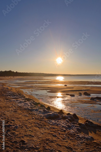 Northern seashore landscape with sunset