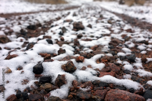 Many stones covered with snow