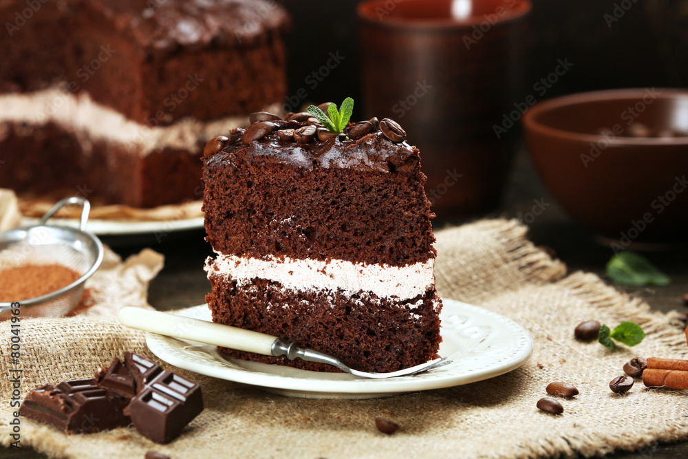 Delicious chocolate cake on table close-up Delicious chocolate cake on table close-up
