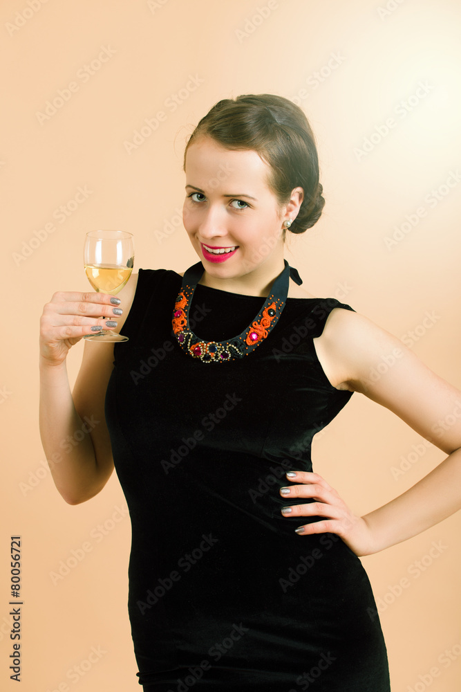 beautiful young brunette woman holding a glass of white wine beautiful young brunette woman holding a glass of white wine