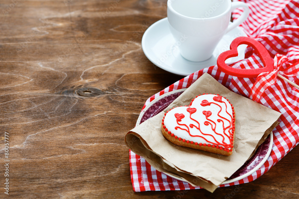 Valentine cookies on a plate and coffee