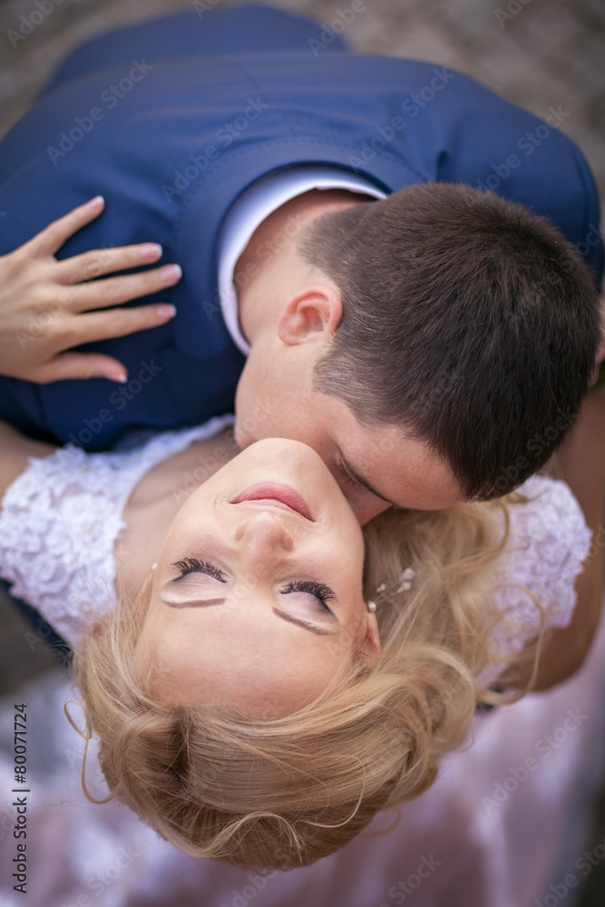 groom kissing bride groom kissing bride