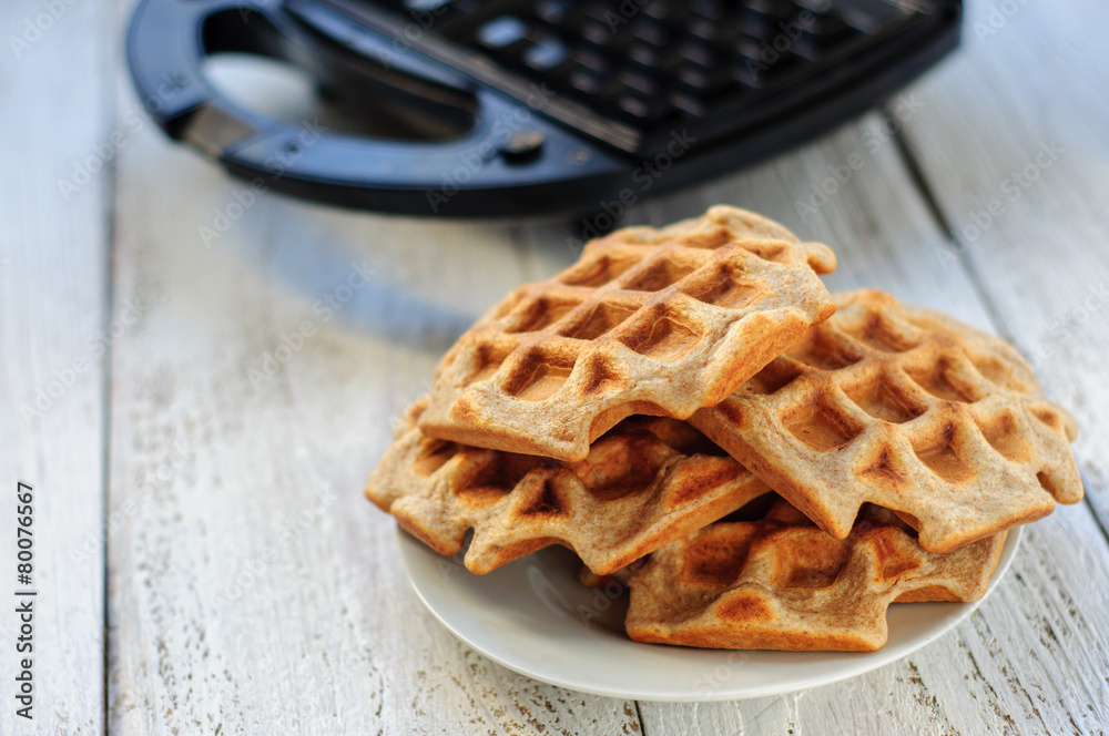 Wholegrain wheat and oat waffles with waffle-iron Wholegrain wheat and oat waffles with waffle-iron