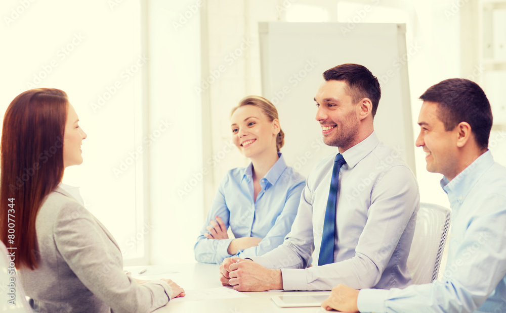 smiling businesswoman at interview in office smiling businesswoman at interview in office