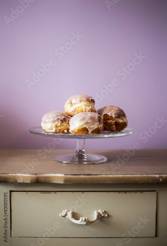 donuts lying on a decorative plate
