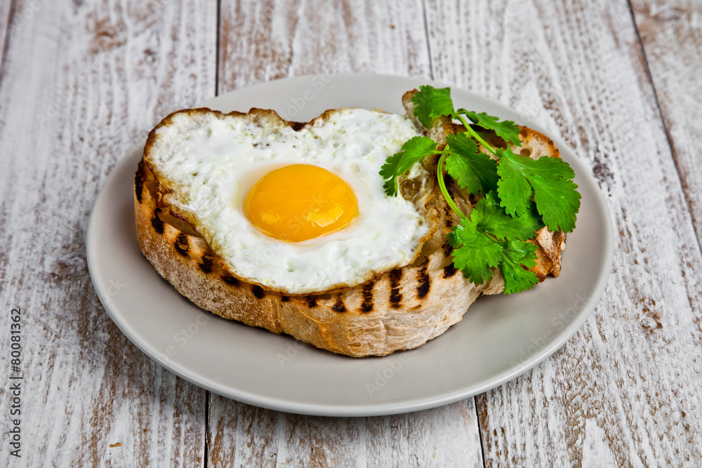 Eggplant crostini on a wight wood background. Eggplant crostini on a wight wood background.