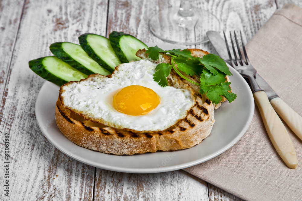 Eggplant crostini on a wight wood background. Eggplant crostini on a wight wood background.